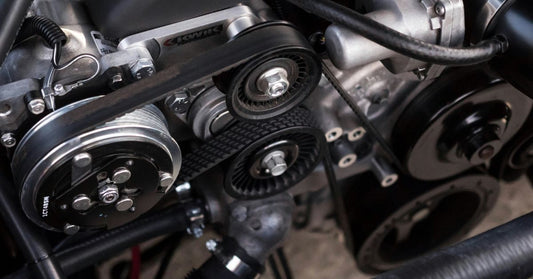 Engine pulley wheels and belts