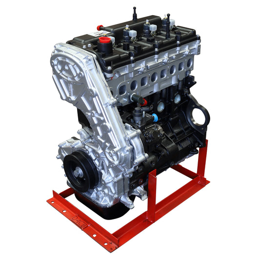A new Hyundai iLoad 2.5 diesel fuelled engine, displayed on a red stand, ready for installation.