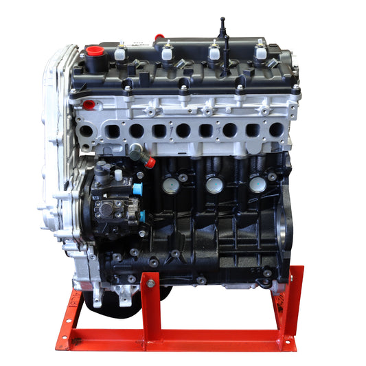 A new Hyundai iLoad 2.5 diesel fuelled engine, displayed on a red stand, ready for installation.