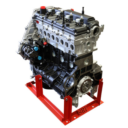 A new Hyundai iLoad 2.5 diesel fuelled engine, displayed on a red stand, ready for installation.