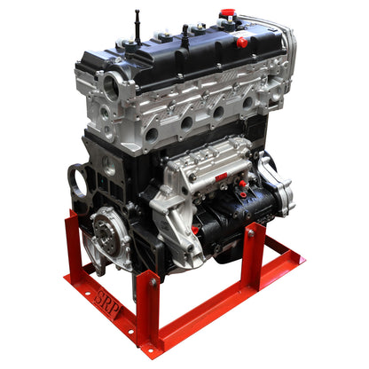 A new Hyundai iLoad 2.5 diesel fuelled engine, displayed on a red stand, ready for installation.