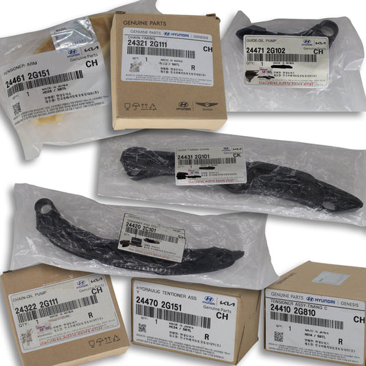 Collection of packaged automotive parts with visible brand labels on a white background